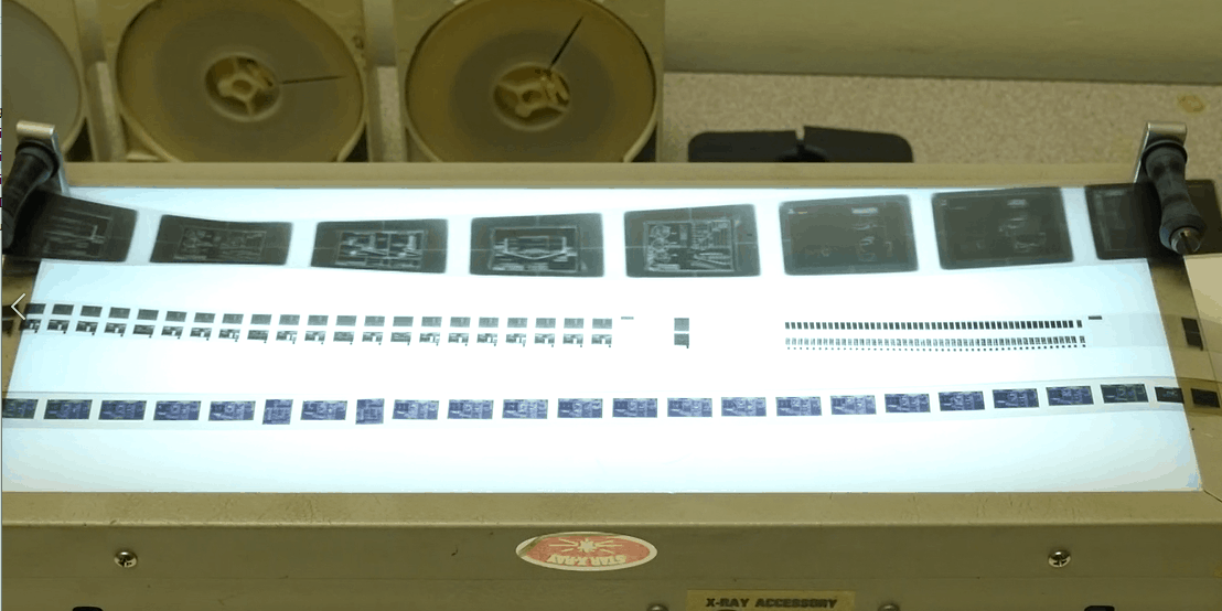 microfilm conversion on lightbox datamation